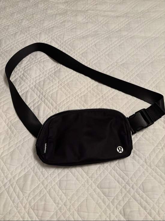 lululemon athletica Handbags - lululemon athletica Black Waist Pack with Adjustable Strap used once!